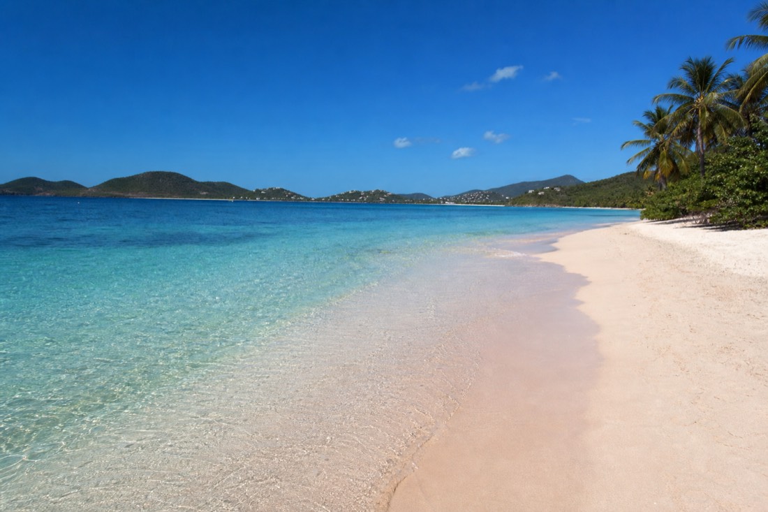 Turquoise shallows over one of Antigua's white-sand beaches